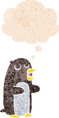 cartoon penguin and thought bubble in retro textured style