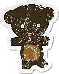retro distressed sticker of a cartoon teddy black bear cub