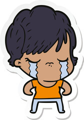 sticker of a cartoon woman crying
