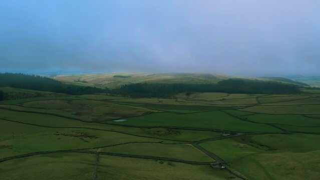 Cinematic aerial video of the mist over the hills in Yorkshire Dales P7