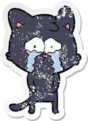 distressed sticker of a cartoon crying cat
