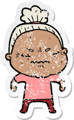 distressed sticker of a cartoon annoyed old lady