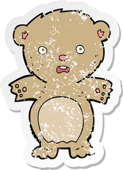 retro distressed sticker of a frightened teddy bear cartoon