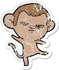 distressed sticker of a cartoon annoyed monkey