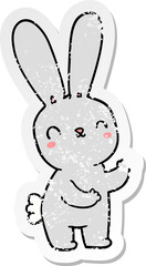 distressed sticker of a cute cartoon rabbit