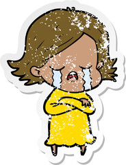 distressed sticker of a cartoon girl crying