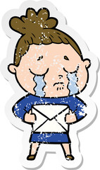 distressed sticker of a cartoon crying woman with letter