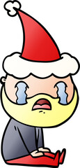 gradient cartoon of a bearded man crying wearing santa hat