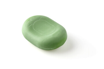 piece of green emollient pistachio soap isolated on white background