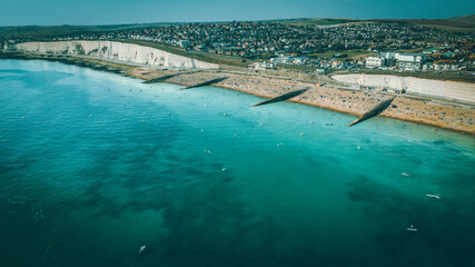 Aerial view of Rottingdean and Brighton coast blue waters, East Sussex, UK.