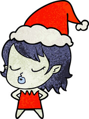 cute textured cartoon of a vampire girl wearing santa hat