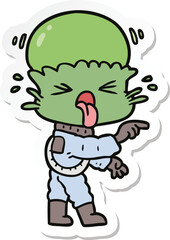 sticker of a weird cartoon alien pointing