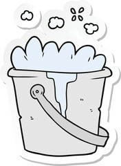 sticker of a cartoon bucket of soapy water