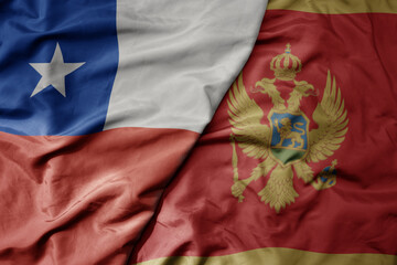 big waving national colorful flag of montenegro and national flag of chile .