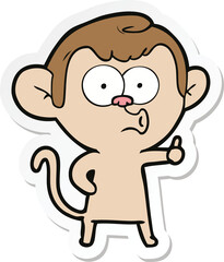 sticker of a cartoon hooting monkey