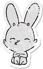 distressed sticker of a curious bunny cartoon