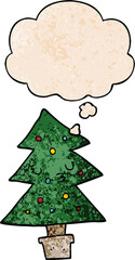 cartoon christmas tree and thought bubble in grunge texture pattern style