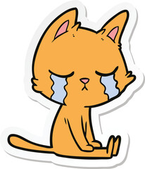 sticker of a crying cartoon cat sitting