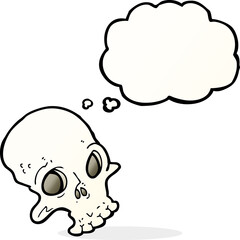 cartoon spooky skull with thought bubble