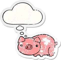 cartoon pig and thought bubble as a distressed worn sticker