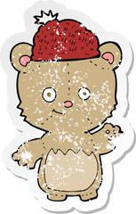 retro distressed sticker of a cartoon bear in hat