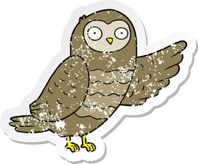 distressed sticker of a cartoon owl pointing