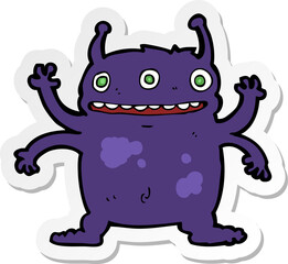 sticker of a cartoon alien monster