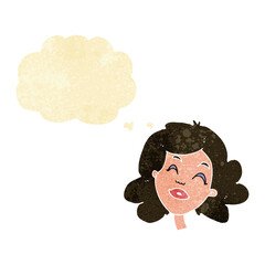 cartoon happy female face with thought bubble