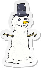 retro distressed sticker of a cartoon snowman in top hat