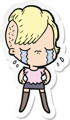 sticker of a cartoon crying girl