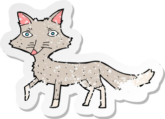 retro distressed sticker of a cartoon little wolf