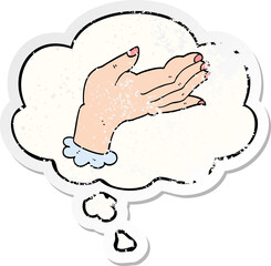 cartoon hand and thought bubble as a distressed worn sticker