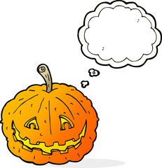 cartoon grinning pumpkin with thought bubble