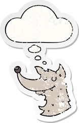 cartoon wolf and thought bubble as a distressed worn sticker
