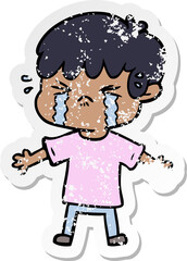 distressed sticker of a cartoon boy crying