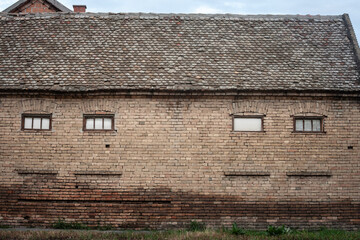 Facade of an old house building from abandoned farmhouse in alibunar, in Serbia with Condemned,...
