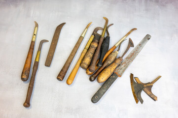 Vintage retro craftsmanship old printing tools on wood