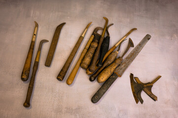 Vintage retro craftsmanship old printing tools on wood