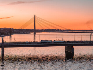 Beautiful aerial sunset over Rigafrom above. Panoramic view of the Riga old town, the capital of Latvia.