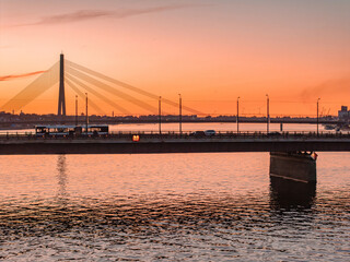 Beautiful aerial sunset over Rigafrom above. Panoramic view of the Riga old town, the capital of Latvia.