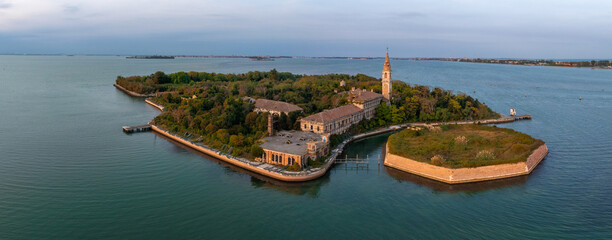Aerial view of the plagued ghost island of Poveglia in the Venetian lagoon, opposite Malamocco...