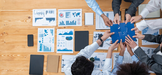 Panorama top view diverse corporate officer worker collaborate in office connect puzzle piece as...