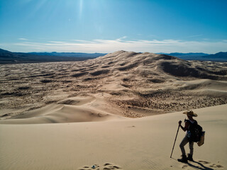 hiker crossing the mohave desert 