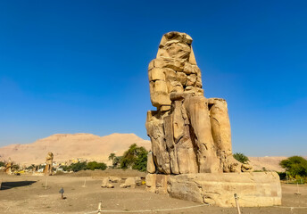 Colossi of Memnon, two massive stone statues representing the pharaoh, Luxor, Egypt