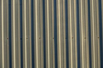 Fototapeta premium profile metal sheet as a background in the sun 2