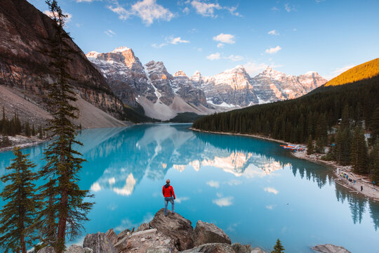 Man standing on a rock, Moraine lake, Banff National Park, Canada