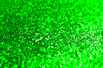 St. Patrick day. Shiny green glitter, closeup