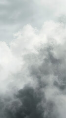 a white hazy fog background with some grey clouds