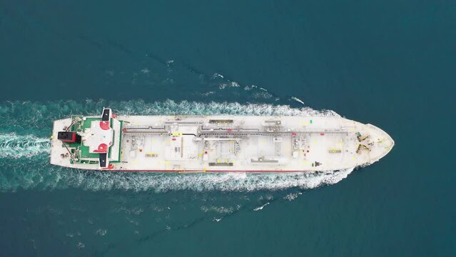 Aerial top down view. Flyover of a LPG Carrier underway calm ocean waters. Liquefied Petroleum Gas tankers designed to carry butane, propane, butadiene, propylene, vinyl chloride monomer and ammonia
