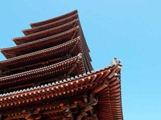 Chinese traditional eaves. The eaves of traditional temples. Beautiful Chinese traditional eaves. Close up view, wooden structure.